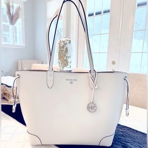 New floor display Michael Kors large tote bag 14”W bottom 18”W top 12” H 5.5”D